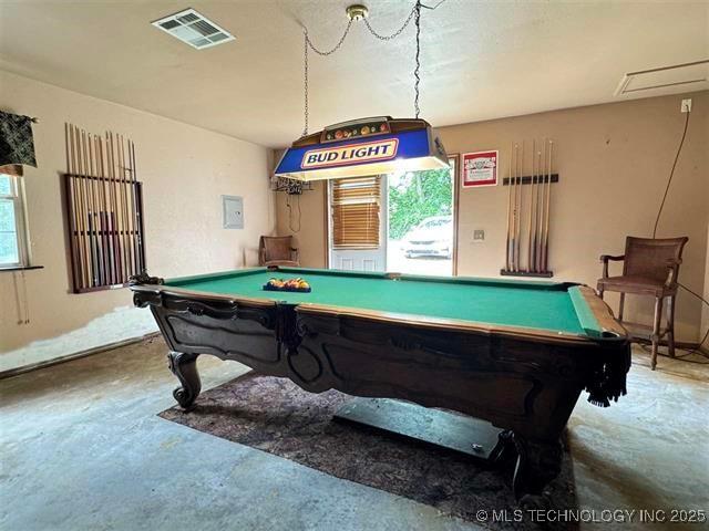 rec room with concrete flooring and billiards