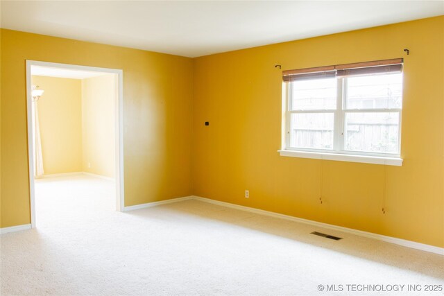 6740 E 51st Pl, Tulsa, OK 74145 - carpeted empty room with baseboards
