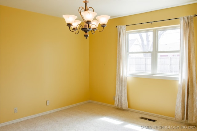 6740 E 51st Pl, Tulsa, OK 74145 - carpeted empty room featuring a chandelier and baseboards