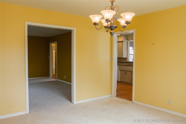 6740 E 51st Pl, Tulsa, OK 74145 - empty room with light carpet, a chandelier, and baseboards