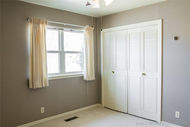 6740 E 51st Pl, Tulsa, OK 74145 - unfurnished bedroom with carpet flooring, a closet, and baseboards