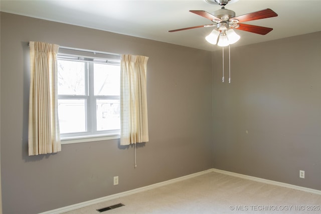 6740 E 51st Pl, Tulsa, OK 74145 - unfurnished room featuring light colored carpet, baseboards, and ceiling fan