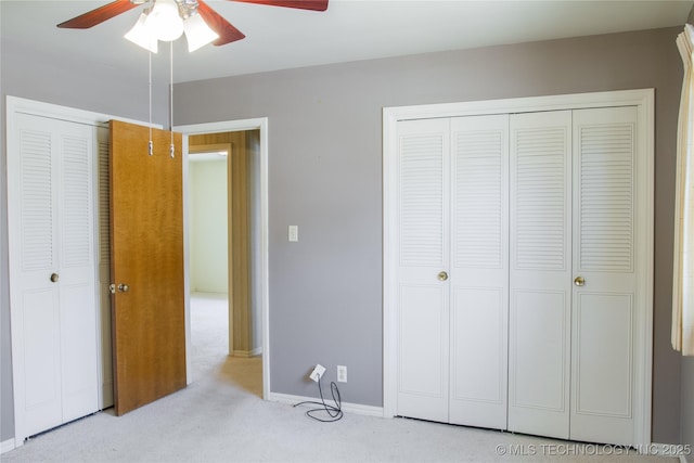 6740 E 51st Pl, Tulsa, OK 74145 - unfurnished bedroom featuring carpet, baseboards, a ceiling fan, and a closet