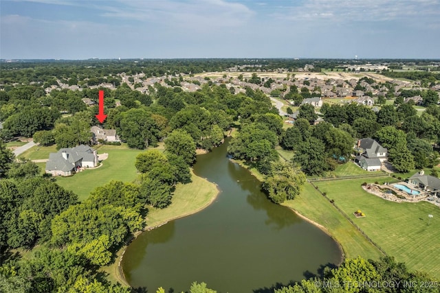 birds eye view of property featuring a water view