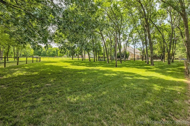 view of yard featuring fence