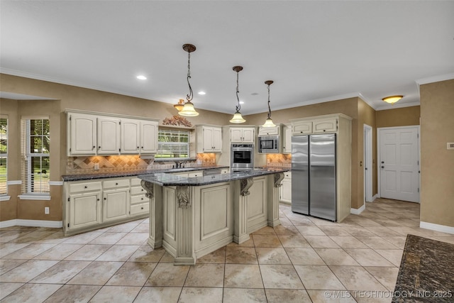 kitchen with a center island, decorative backsplash, dark stone countertops, decorative light fixtures, and stainless steel appliances