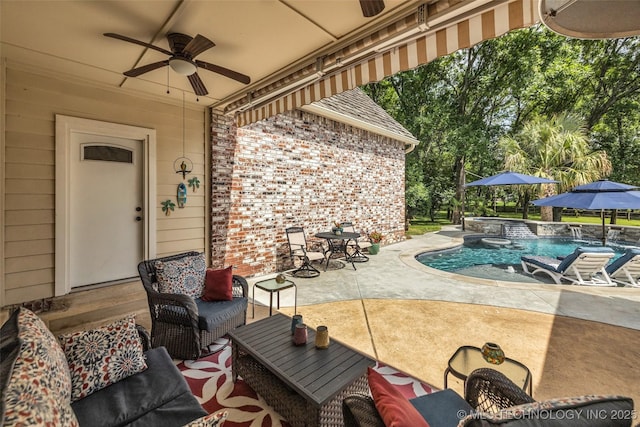 view of patio / terrace featuring an outdoor living space and ceiling fan