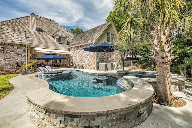 view of pool with a patio