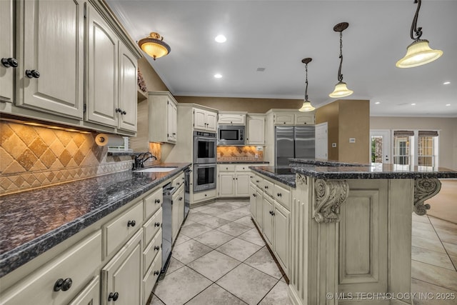 kitchen with appliances with stainless steel finishes, tasteful backsplash, a kitchen breakfast bar, and ornamental molding