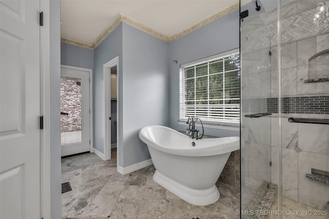 full bathroom featuring a soaking tub, a shower stall, visible vents, and baseboards