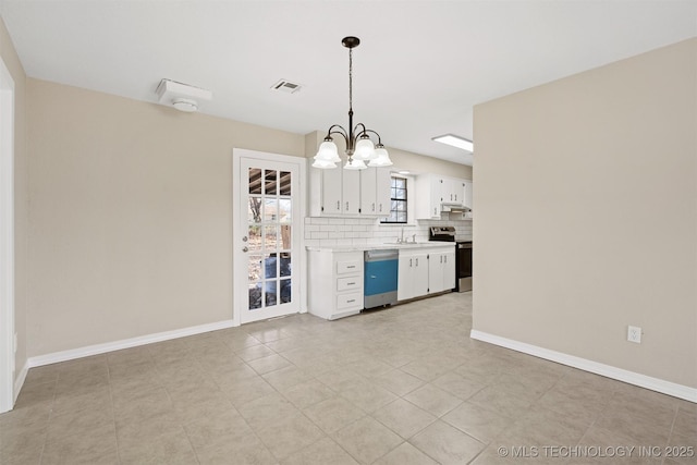 kitchen with backsplash, stainless steel appliances, a chandelier, white cabinetry, and hanging light fixtures