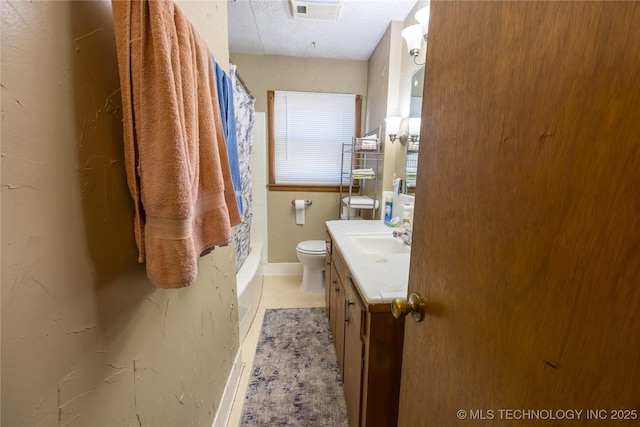 bathroom with tile patterned flooring, vanity, toilet, and curtained shower