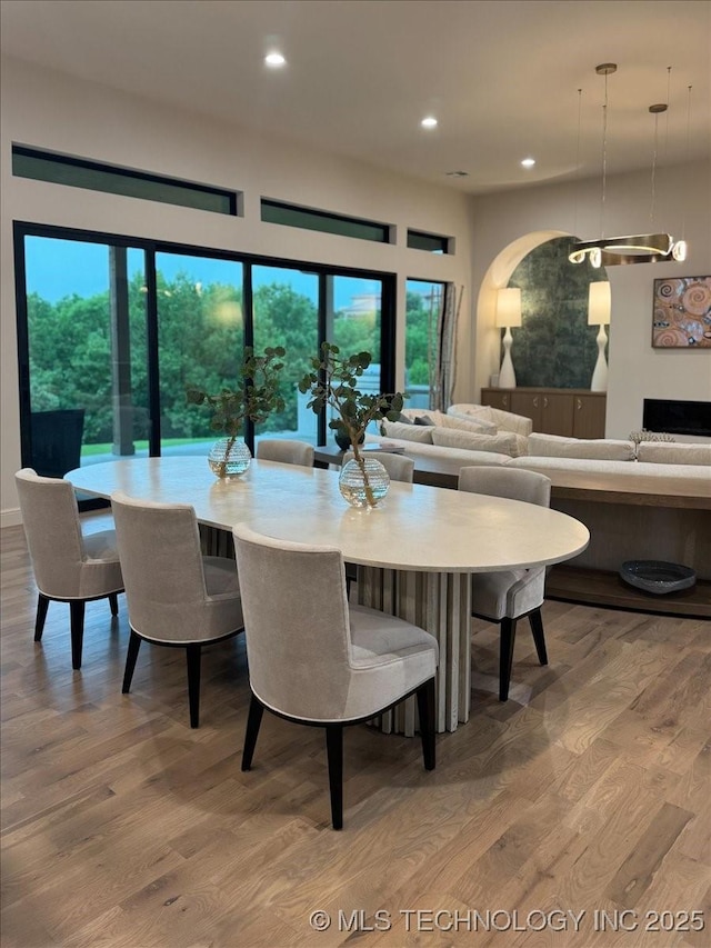 5835 E 139th St S, Bixby, OK 74008 - dining area featuring wood finished floors, recessed lighting, and a chandelier