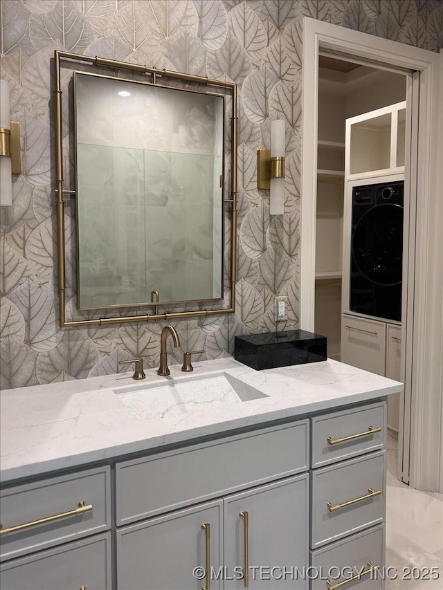 5835 E 139th St S, Bixby, OK 74008 - bathroom featuring vanity and wallpapered walls