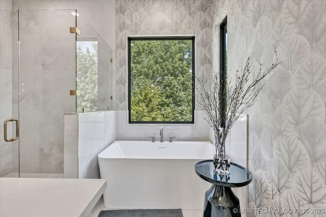 5835 E 139th St S, Bixby, OK 74008 - bathroom featuring a freestanding tub and a shower stall