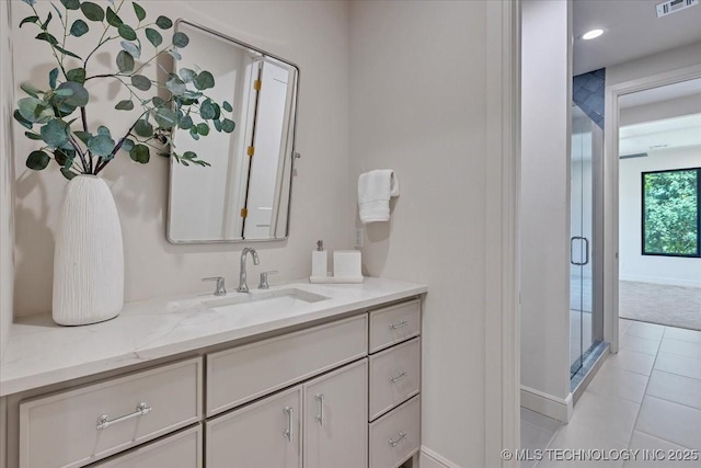 5835 E 139th St S, Bixby, OK 74008 - bathroom with vanity, a shower stall, and tile patterned flooring