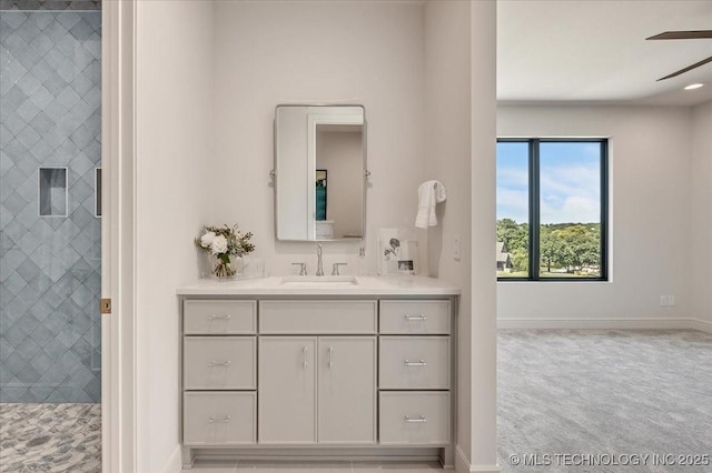 5835 E 139th St S, Bixby, OK 74008 - bathroom with vanity, a ceiling fan, and a tile shower