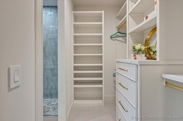 5835 E 139th St S, Bixby, OK 74008 - spacious closet featuring tile patterned flooring