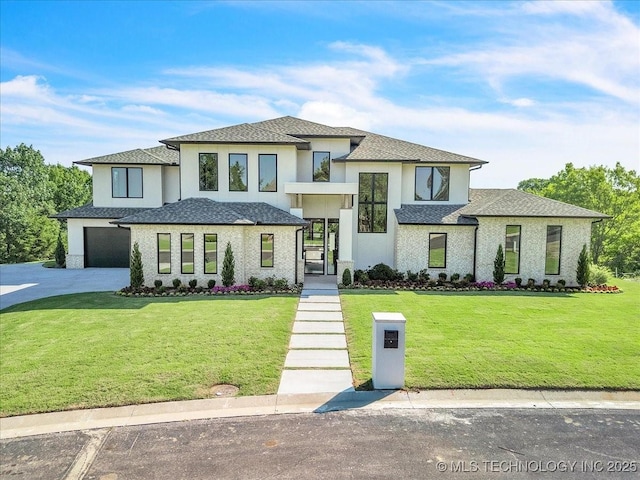 5835 E 139th St S, Bixby, OK 74008 - view of front of home with a garage, driveway, a front yard, and a shingled roof