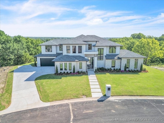 5835 E 139th St S, Bixby, OK 74008 - view of front of house featuring concrete driveway, a front yard, a garage, and a shingled roof