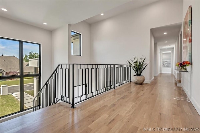 5835 E 139th St S, Bixby, OK 74008 - hallway featuring recessed lighting, wood finished floors, and an upstairs landing