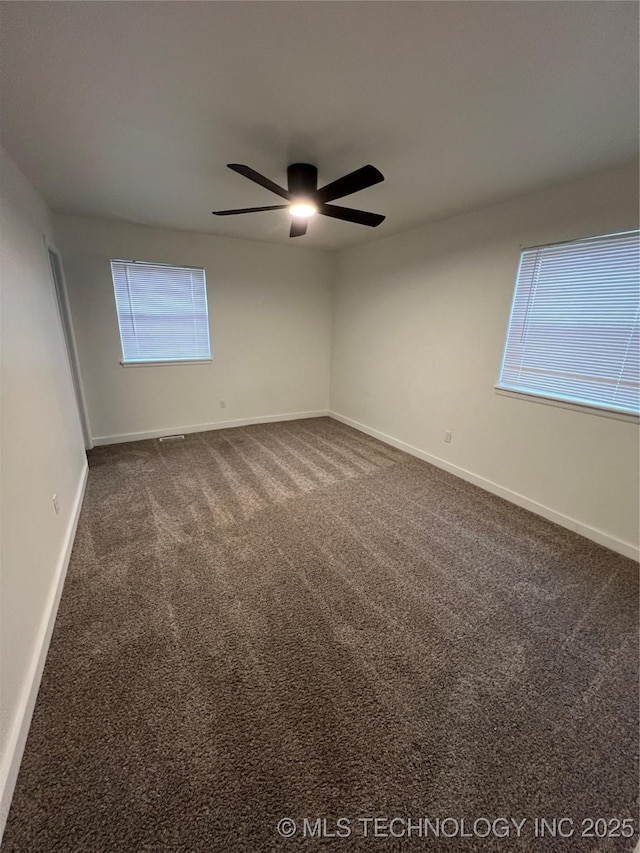 carpeted empty room with ceiling fan