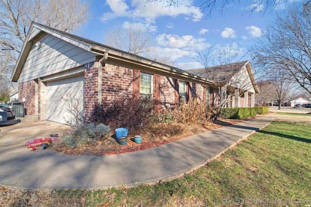 view of side of home with a garage