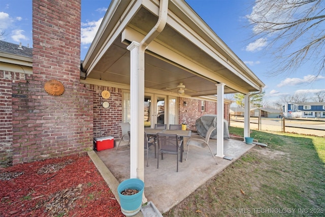 view of patio / terrace featuring area for grilling and ceiling fan