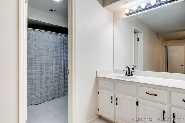 bathroom with tile patterned flooring, visible vents, vanity, and a shower with curtain