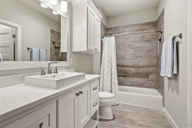 full bathroom with wood-type flooring, toilet, vanity, and shower / bathtub combination with curtain