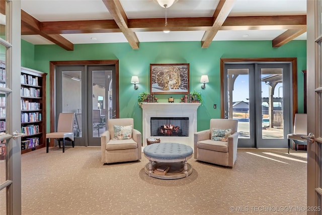 living area with french doors, carpet flooring, beam ceiling, and coffered ceiling