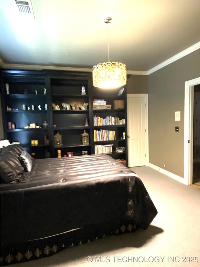 bedroom with carpet flooring and crown molding