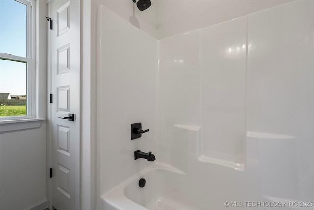 bathroom featuring shower / tub combination