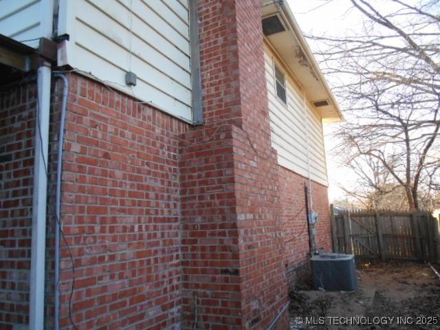 view of property exterior with central air condition unit