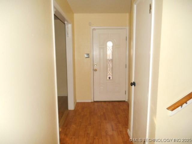 corridor featuring light hardwood / wood-style floors