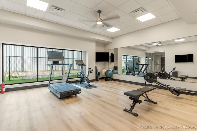 405 N Main St Unit 4A, Tulsa, OK 74103 - gym featuring a paneled ceiling, ceiling fan, and hardwood / wood-style flooring