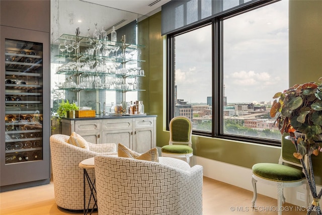 405 N Main St Unit 4B, Tulsa, OK 74103 - indoor wet bar featuring light wood-type flooring