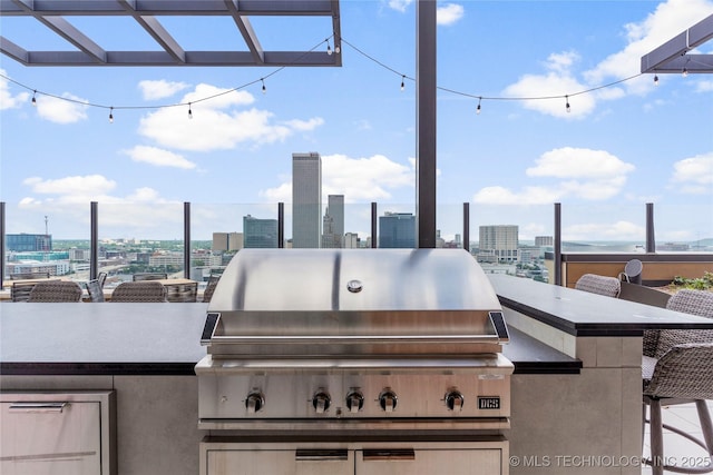 view of patio with a grill