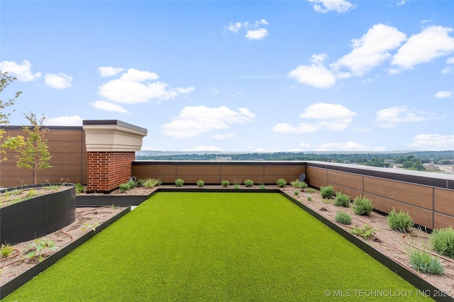 405 N Main St Unit 4B, Tulsa, OK 74103 - fenced backyard featuring a bocce ball area