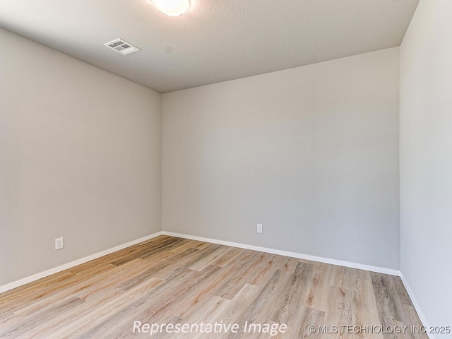 empty room featuring light wood-type flooring