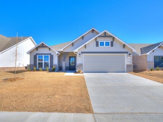 craftsman-style house featuring central AC, an attached garage, concrete driveway, and board and batten siding