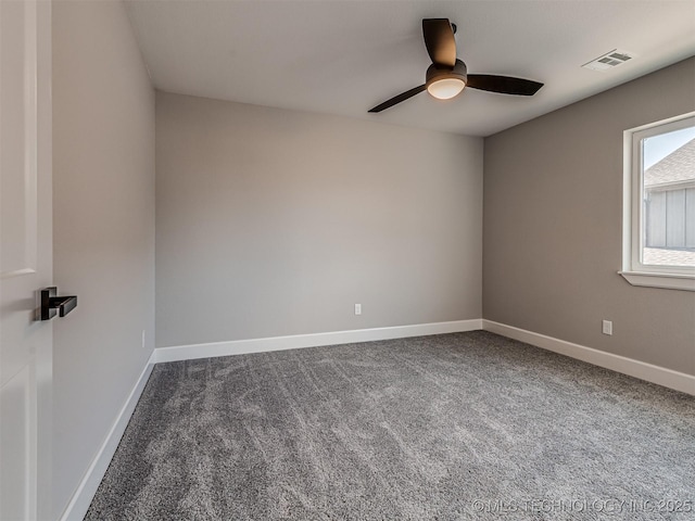 empty room featuring carpet flooring and ceiling fan