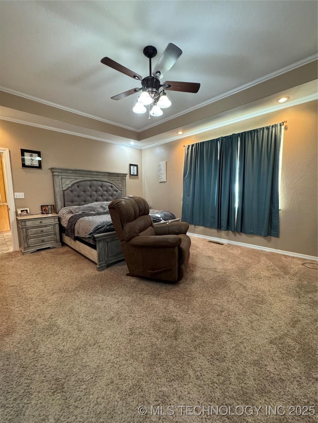 bedroom featuring ceiling fan, carpet, and ornamental molding