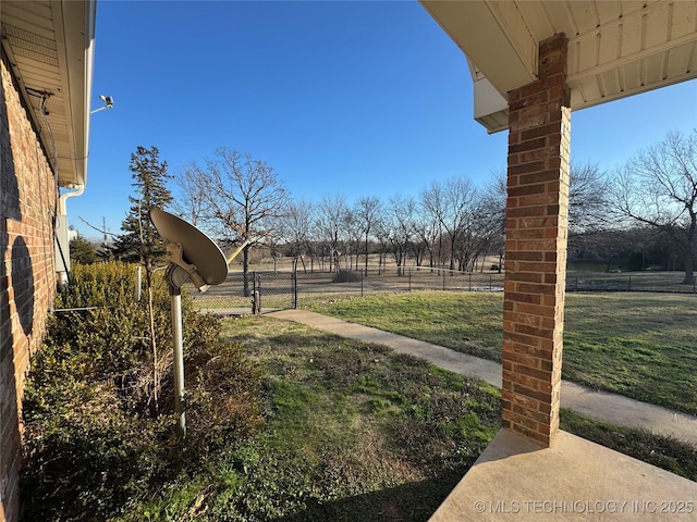 view of yard with a rural view