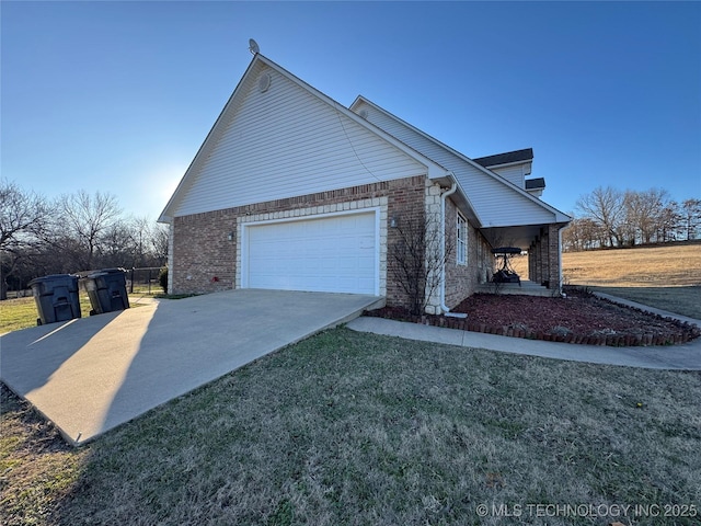 view of property exterior featuring a garage and a yard