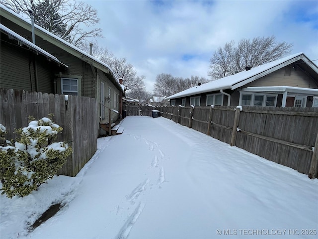 view of yard covered in snow