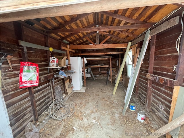 interior space featuring vaulted ceiling