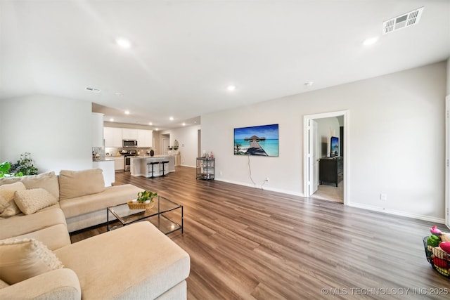 living room with light hardwood / wood-style floors