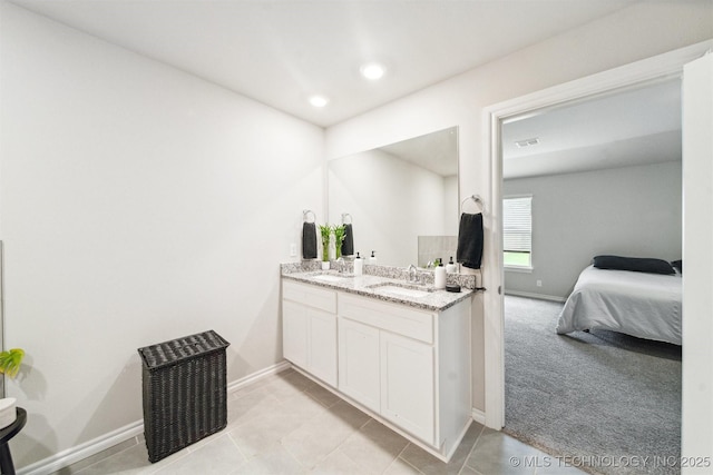 bathroom with vanity and tile patterned floors