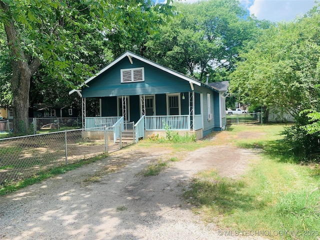 bungalow-style home with covered porch